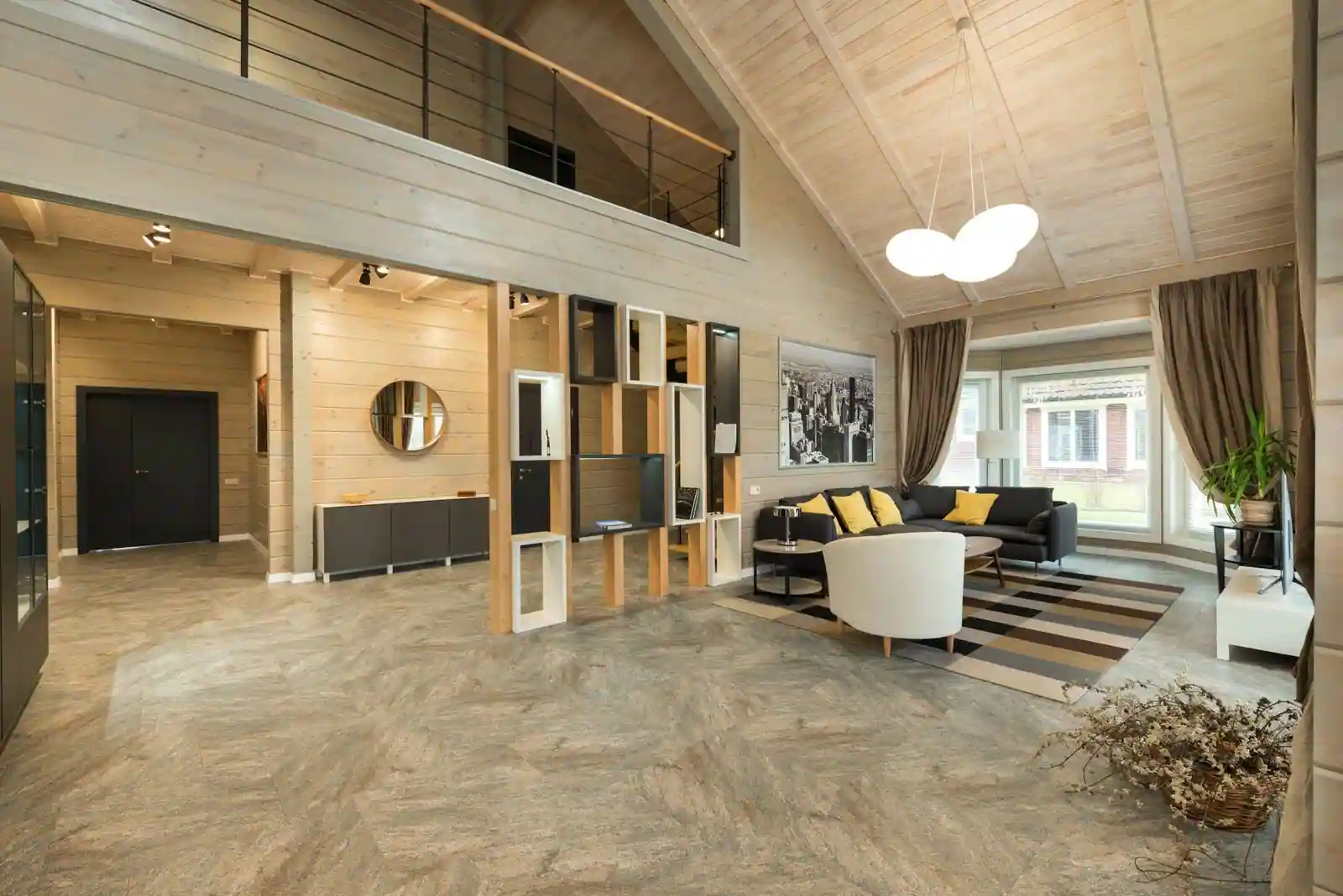 Intérieur clair d'un logement meublé, salon avec canapé, illustrant le mobilier au sein d'un bien immobilier.